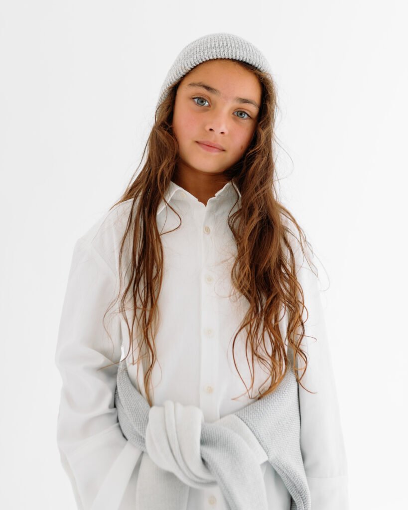 Girl in the Tres London Kensington shirt dress and a grey beanie